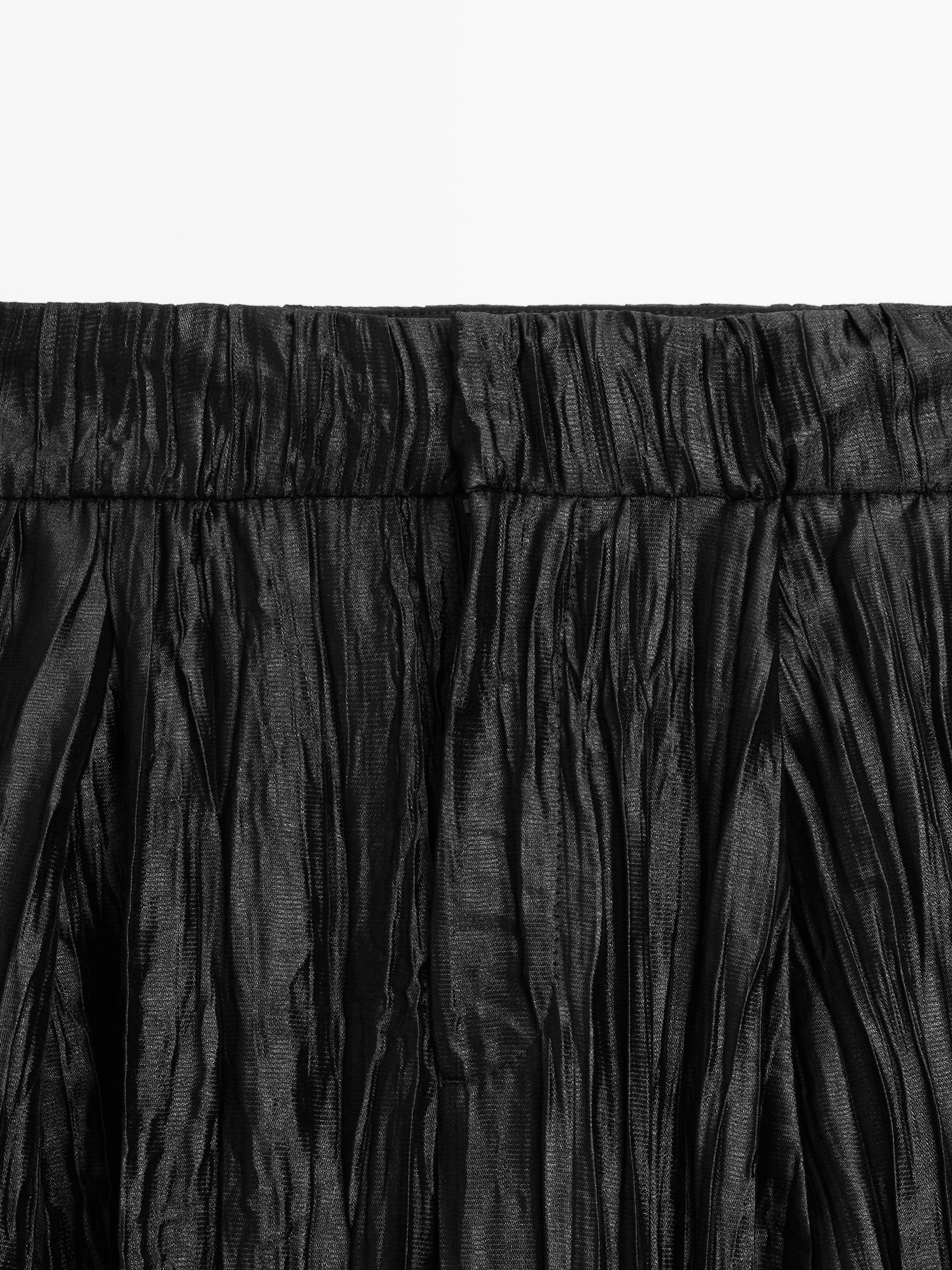 Creased pleated-effect wide-leg trousers